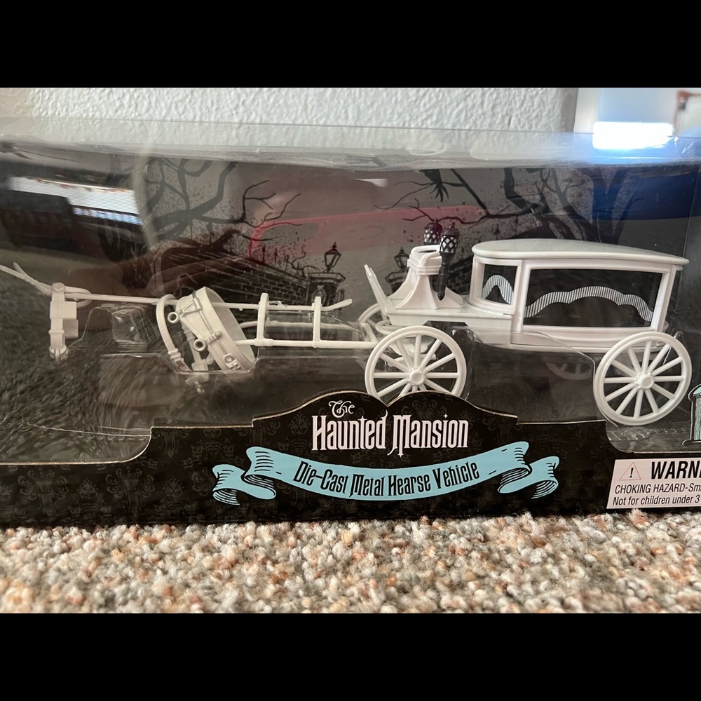 The Haunted Mansion die cast metal hearse vehicle- opened box